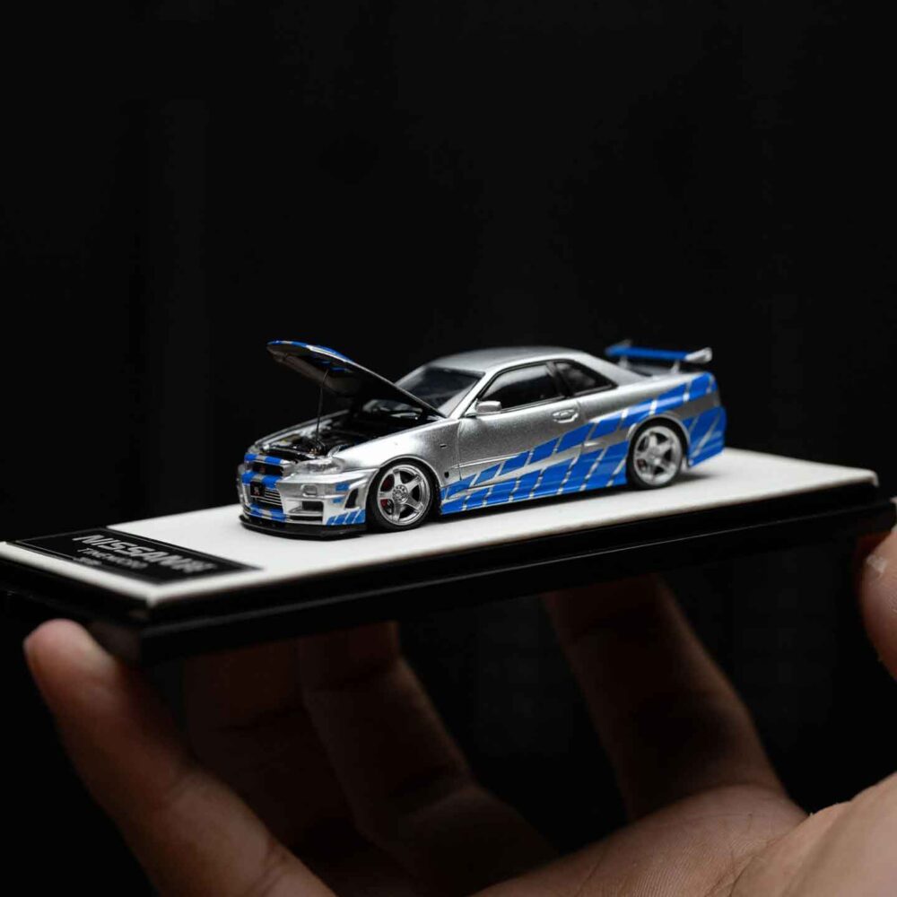 Cool Art 1:64 Nissan GT-R R34 diecast model in blue and silver livery