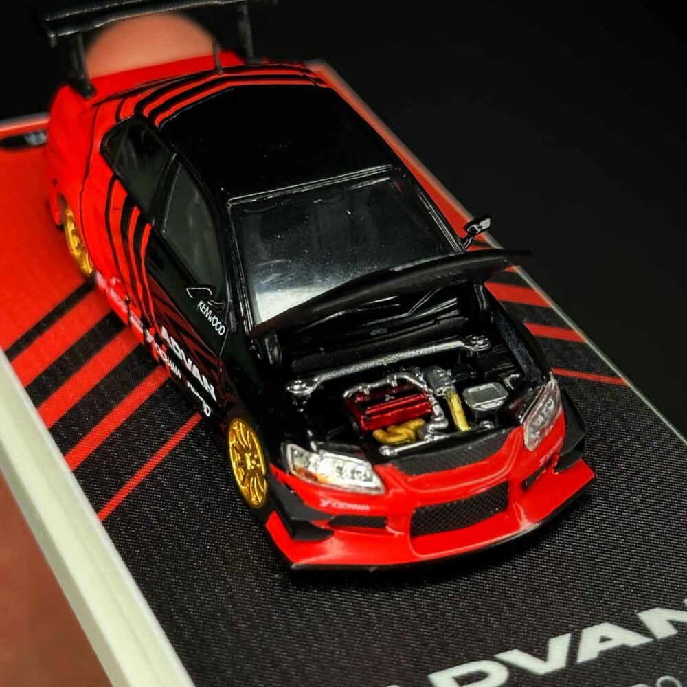 Time Micro 1:64 Mitsubishi Lancer Evolution IV diecast car in Advan racing livery