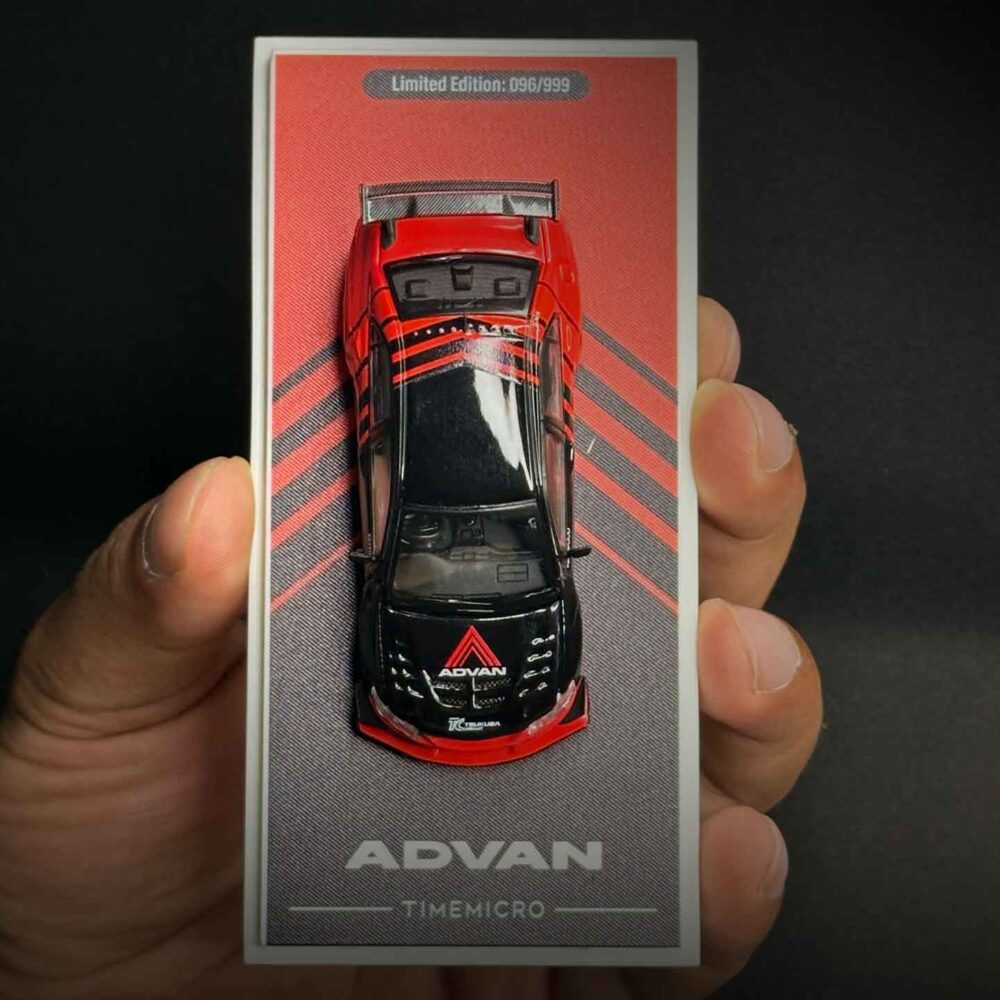 Time Micro 1:64 Mitsubishi Lancer Evolution IV diecast car in Advan racing livery