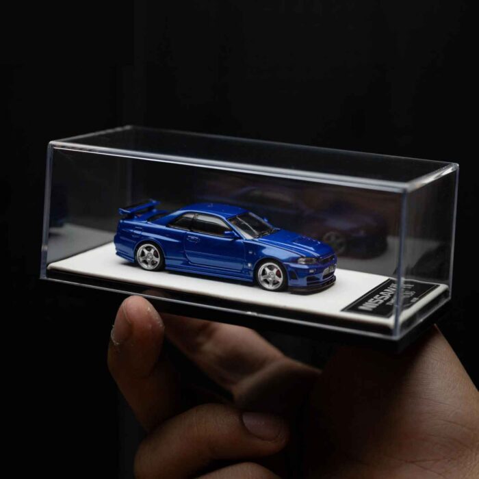Cool Art 1:64 Nissan Skyline GT-R R34 diecast model in metallic blue