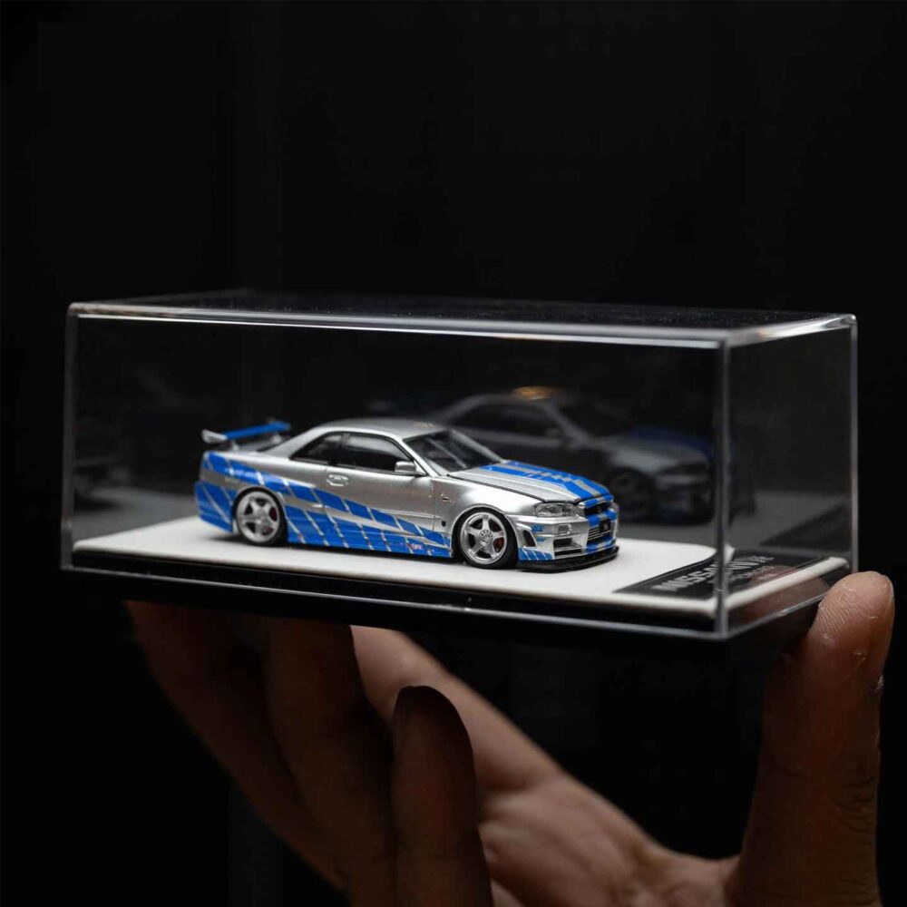 Cool Art 1:64 Nissan GT-R R34 diecast model in blue and silver livery