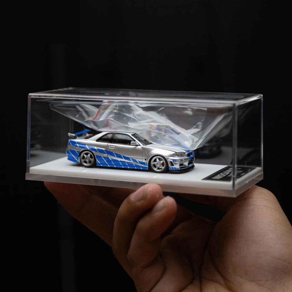 Cool Art 1:64 Nissan GT-R R34 diecast model in blue and silver livery