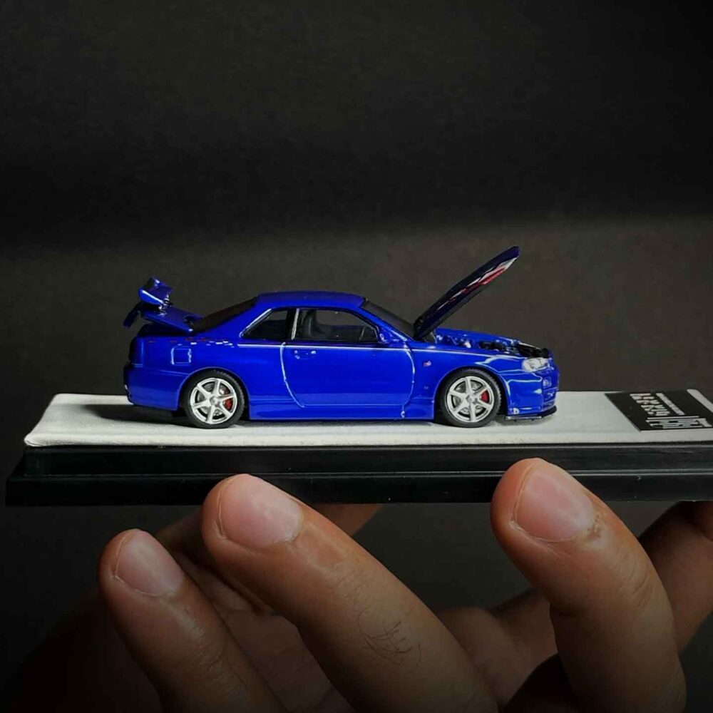 Nissan GT-R R34 1:64 diecast model in Speed and Passion Blue with widebody kit