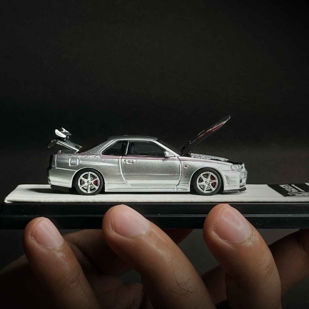 Cool Art 1:64 Nissan Skyline GT-R R34 diecast model in metallic silver