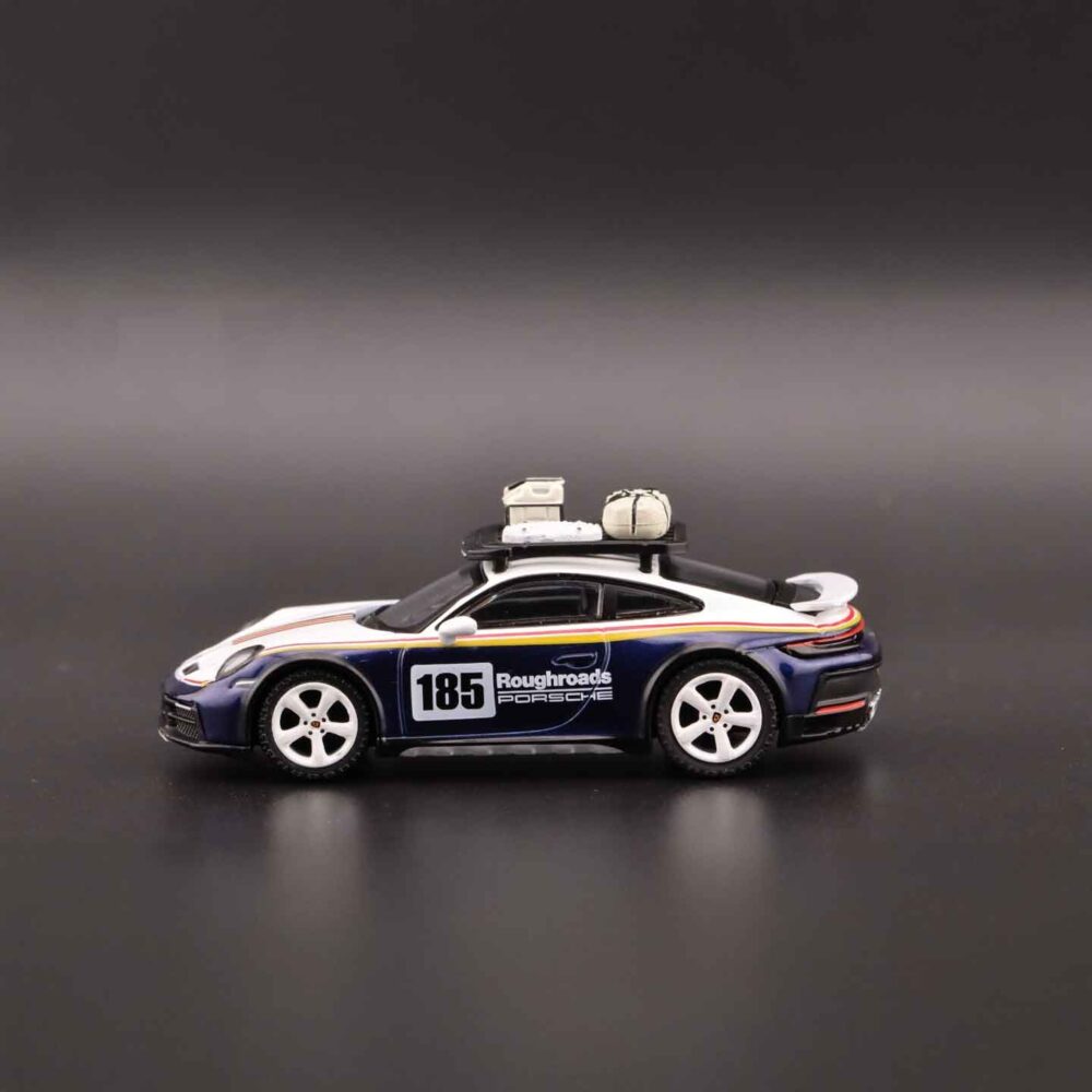 1:64 Mini GT Porsche 911 Dakar diecast car with off-road rally details