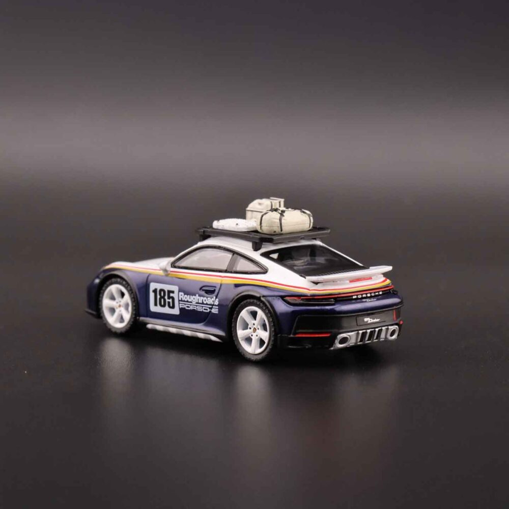 1:64 Mini GT Porsche 911 Dakar diecast car with off-road rally details