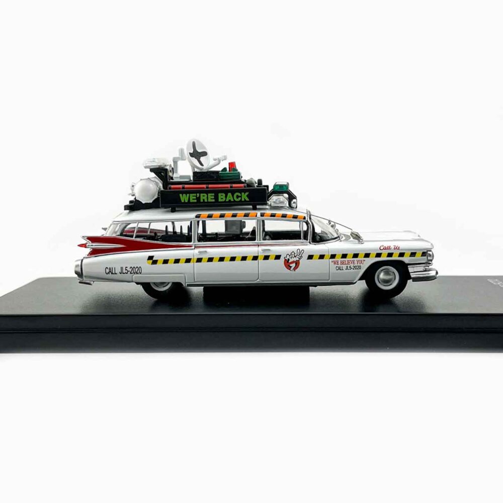 Ghostbusters Ecto-1 diecast car collectible Close-up of Ghostbusters Ecto-1 diecast model Side view of Ghostbusters Ecto-1 movie car replica